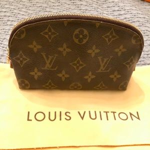 Louis Vuitton small cosmetic pouch carried a couple of times, like new